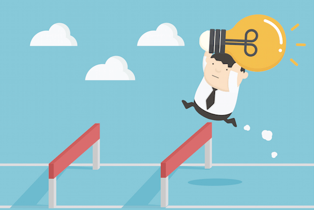 Man-Jumping-Over-a-Hurdle